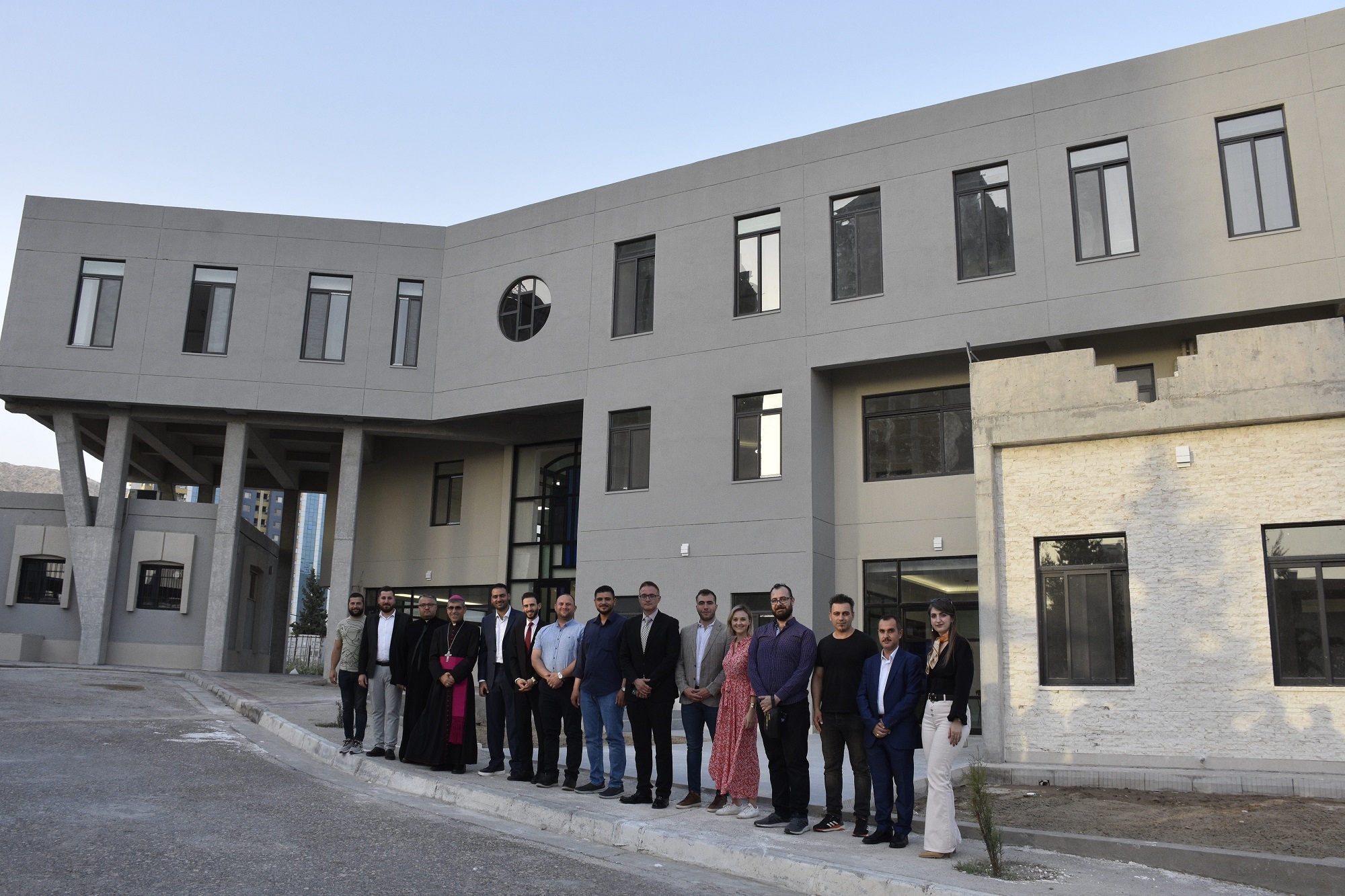 Group photo with Bishop Azad Shaba in front of the Papa Francisco Pastoral Center in Duhok.Inauguration of the of Papa Francisco Pastoral Center in Duhok with Bishop Azad Shaba on July 08th 2023IRAQ / DOHUK-CLD 22/00034Completion of Papa Francisco Pastoral Center, Duhok